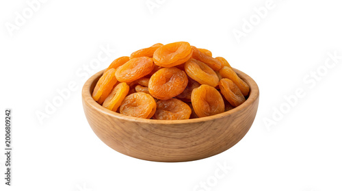 dried apricots in a wooden bowl on white background