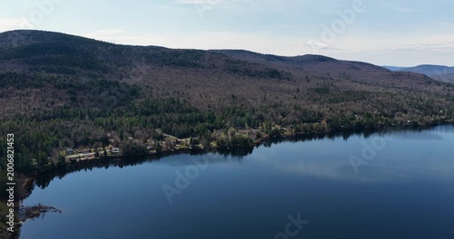 Long Lake, NY, USA  April 29, 2026  Aerial video of the scenic hamlet of Long Lake and Raquette River in the heart of New York's Adirondack Mountains.