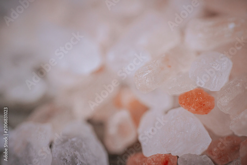 Obraz na płótnie Extreme close-up of light pink rock salt crystals with soft, shallow focus, translucent texture and fine mineral details