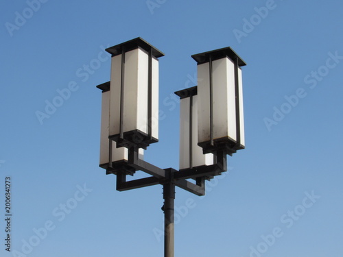 street lamp on blue sky