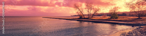 Billede på lærred Embankment at sunset in Neringa, Lithuania. Curonian Spit