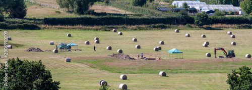 Photography Hay bales in countryside field near Bodiam, East Sussex, England