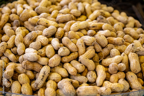 Εκτύπωση καμβά The peanut, also known as the groundnut, goober, goober pea, pindar or monkey nut, is a legume crop grown mainly for its edible seeds, contained in underground pods