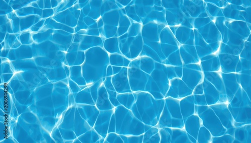 Vibrant blue swimming pool water surface with ripples and sun reflections creating abstract patterns and textures