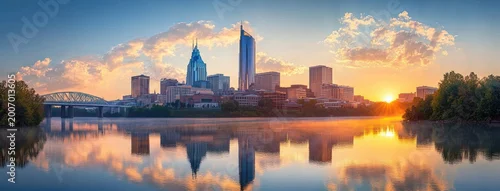 Panel kuchenny z motywem sunrise over a calm river reflecting a modern city skyline with skyscrapers and a steel bridge, golden clouds and tree-lined banks creating a peaceful, hopeful morning
