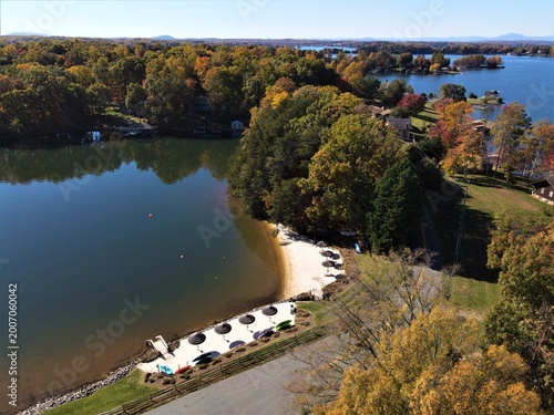 Schilderij op canvas Aerial View of Private Sandy Beach and Umbrellas on Smith Mountain Lake Virginia