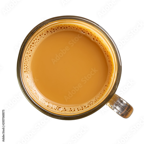 A hot cup of frothy coffee is seen from above in a mug