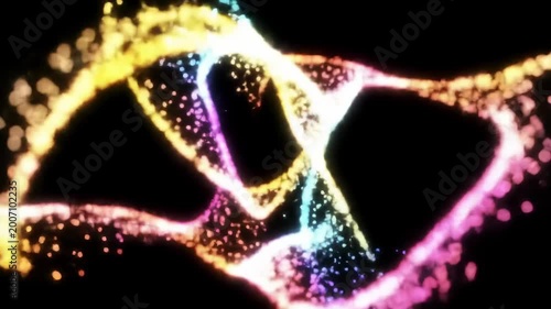 Abstract DNA strand of colorful glowing particles against a black backdrop