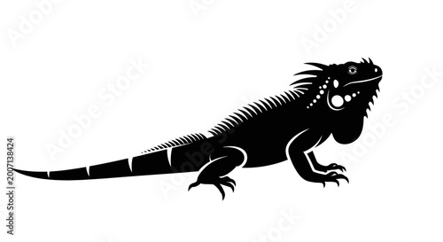 Obraz na płótnie Black silhouette of an iguana reptile on a white background isolated vector