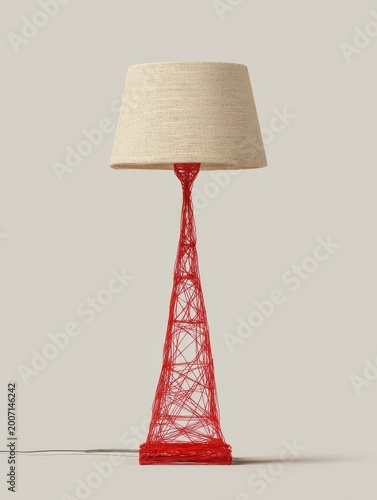Decorative Floor Lamp With Textured Shade And Red Wire Frame Base Subtle Lighting Soft Shadows Neutral Studio Background