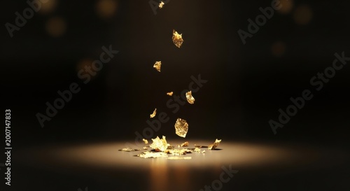 Shimmering Gold Leaf Fragments Falling in Dramatic Light