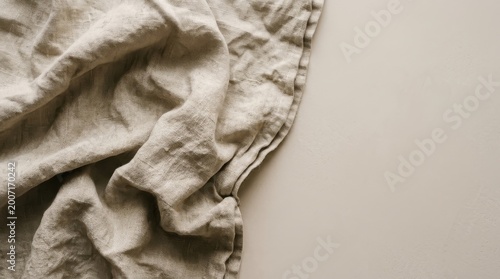 Natural Linen Fabric Backdrop on Neutral Beige Concrete Surface with Copy Space for Minimalist Product Placement