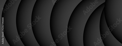 Photography An abstract black and white background featuring a vintage vinyl record disc wit