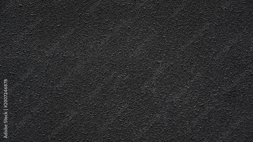 Fototapeta premium Dark black rough wall textured background wall