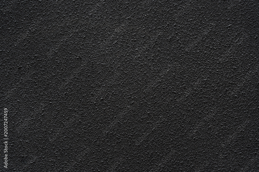 Fototapeta premium Dark black rough wall textured background wall