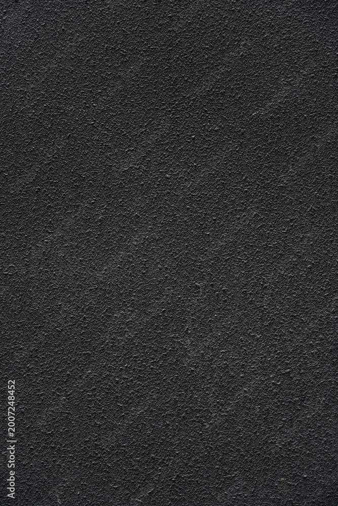 Fototapeta premium Dark black rough wall textured background wall