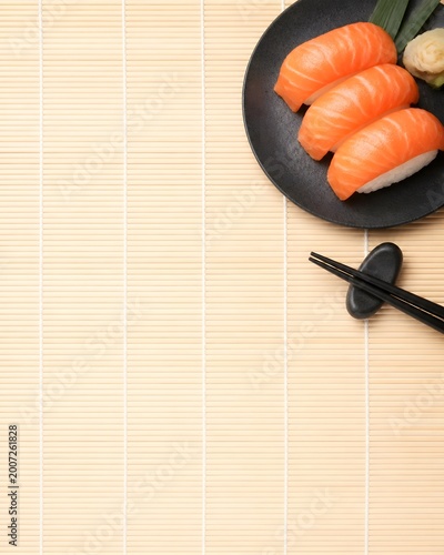 Zen Minimalist Salmon Nigiri Flat Lay with Chopstick Bamboo Background  with Copy Space