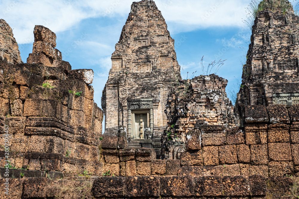 Naklejka premium Travel heritage concept historic khmer architecture with guardian animals at famous religious site in siem reap cambodia asia