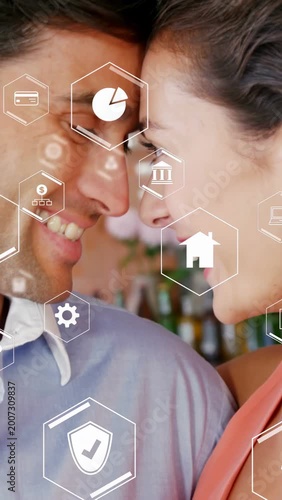 Vertical video: Couple leaning in at bar activating hex UI on faces seeking dating match