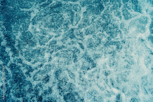 Powerful rushing water with white foam and liquid energy background