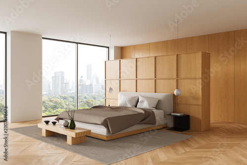 Modern minimalist bedroom interior with wood panel walls, large windows overlooking city skyline, neutral decor and serene atmosphere. 3D Rendering