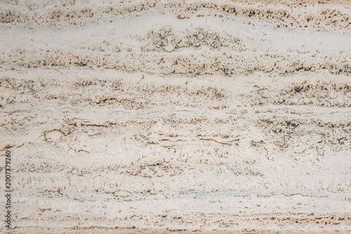 Light beige marble texture with natural horizontal stone pattern. Neutral background with subtle details, ideal for design, branding, and copy space.