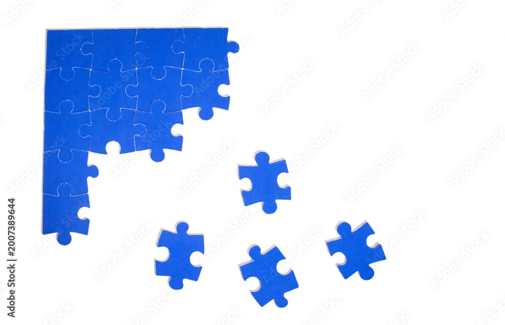 Fototapeta premium Blue puzzle nearly complete, one piece missing 