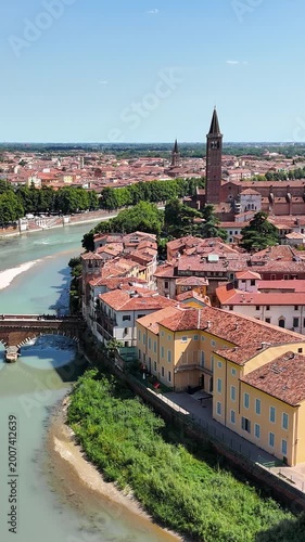 Aerial view of Verona cityscape with Adige river and medieval architecture showing timeless beauty.