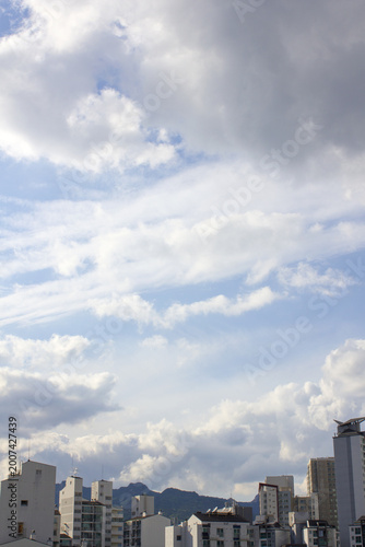A view of the apartment and a sky with beautiful clouds