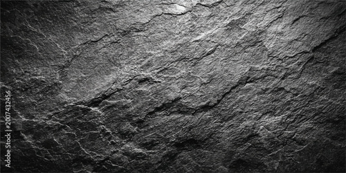 Fotografie A rough grunge backdrop features an aged dark wood texture with a cracked grey s
