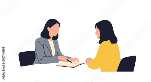 Photos Two professional women having a business meeting or job interview at a table