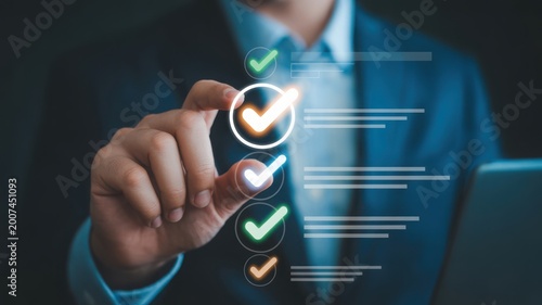 Businessman touching a virtual checklist with checkmarks for project management and quality control