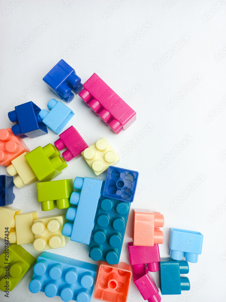 Fototapeta premium Children's Lego toys on a white background