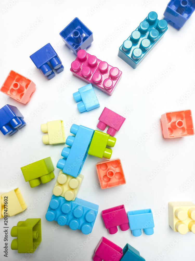 Fototapeta premium Children's Lego toys on a white background