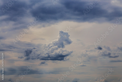 Fotografie Stormy sky with dark, brooding clouds