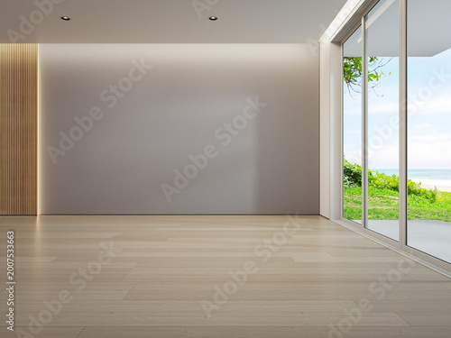 Minimalist empty living room with wooden floor and wall panels 3d rendering. Blue sky ocean beach view through large sliding glass door of calm interior for vacation relaxation.