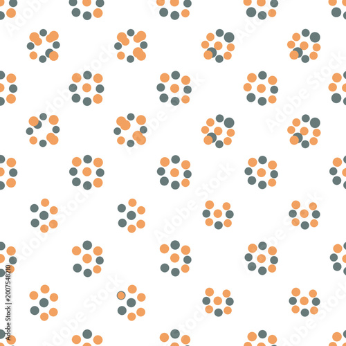 Colorful dots forming circular patterns.