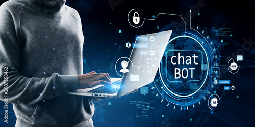 Anonymous person using laptop with digital chatbot interface and futuristic c...