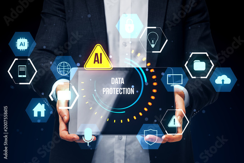 Data protection interface held by person with glowing tech icons and security...