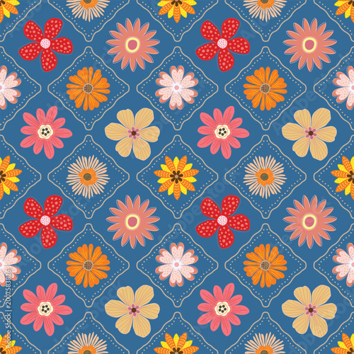 Colorful folk art floral seamless pattern with vibrant spring flowers on a blue background vector illustration design