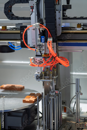 Close up of robotic arm in industrial automation production equipment