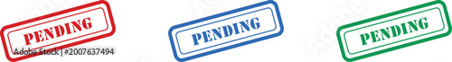 Photos A set of three colorful rubber stamp impressions features the word PENDING on a