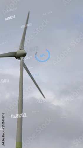 Vertical video: Turbine rotating by gust, camera panning as telemetry updating to show performance