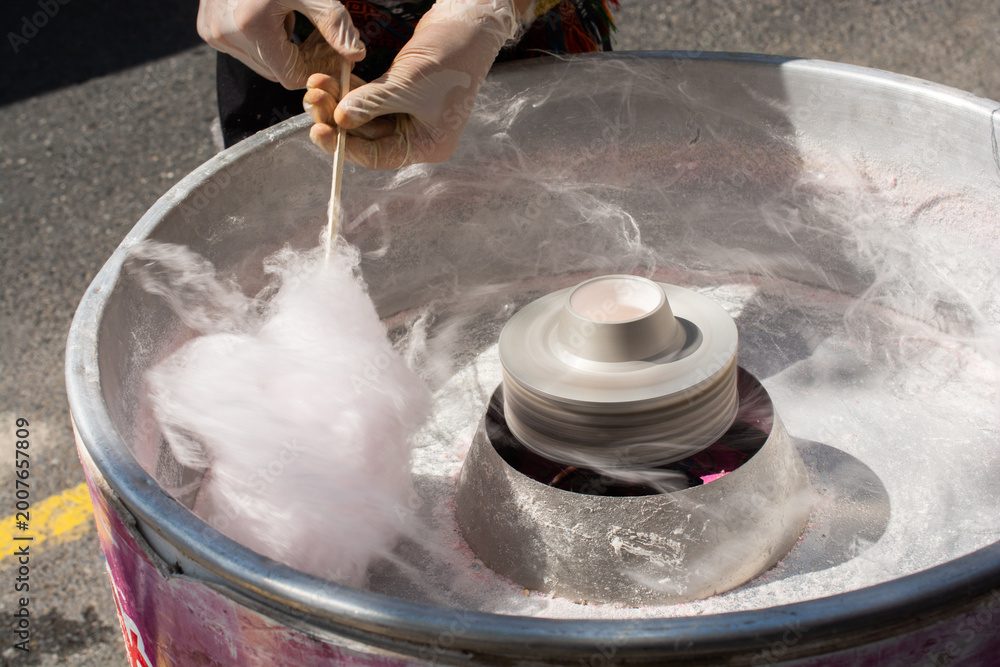 Fototapeta premium Making cotton candy on the street