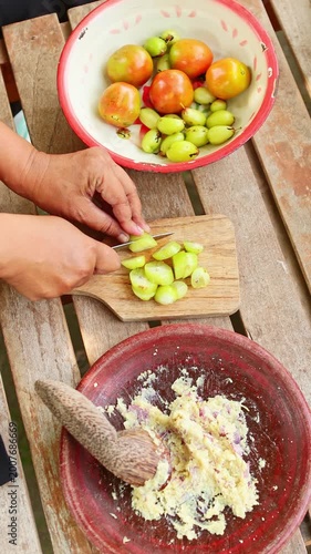 Traditional Indonesian sambal preparation process with local ingredients