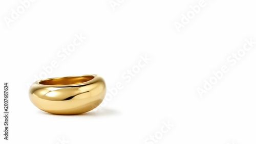 gold wedding ring isolated on white background with soft reflection and elegant shine