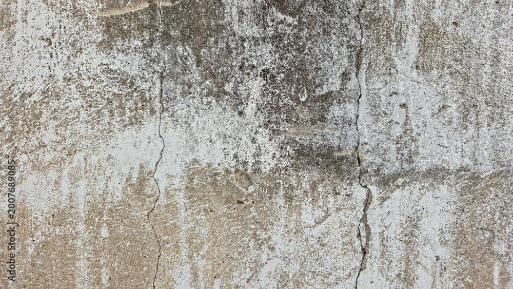 Fototapeta premium Weathered and Cracked Concrete Wall Texture with Gritty Stained Surface and Distressed Gray Cement Finish 