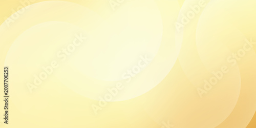 Abstract yellow and gold background with soft overlapping circles and smooth wavy gradients for elegant luxury design.
