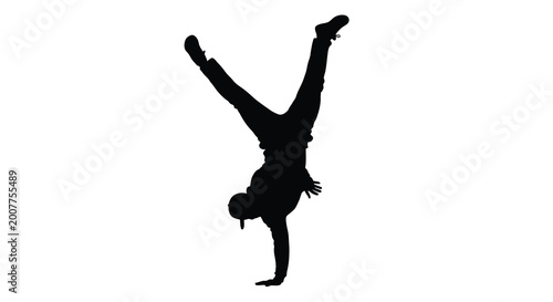Bild auf Leinwand Breakdancer performing handstand pose against white background silhouette