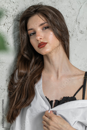 Studio portrait of a young beautiful brunette woman